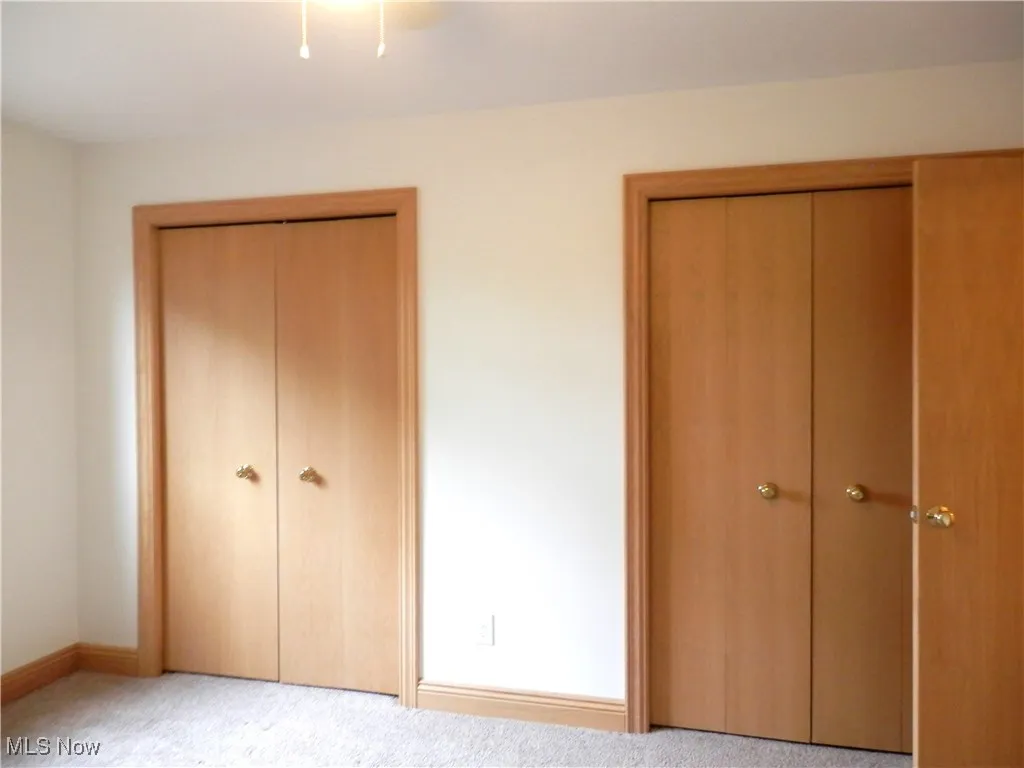 Upstairs bedroom with lots of closets