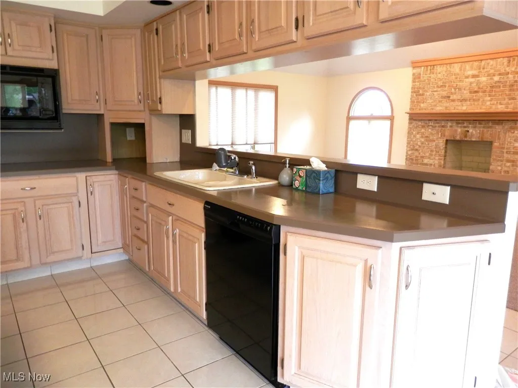 Kitchen with tile flooring
