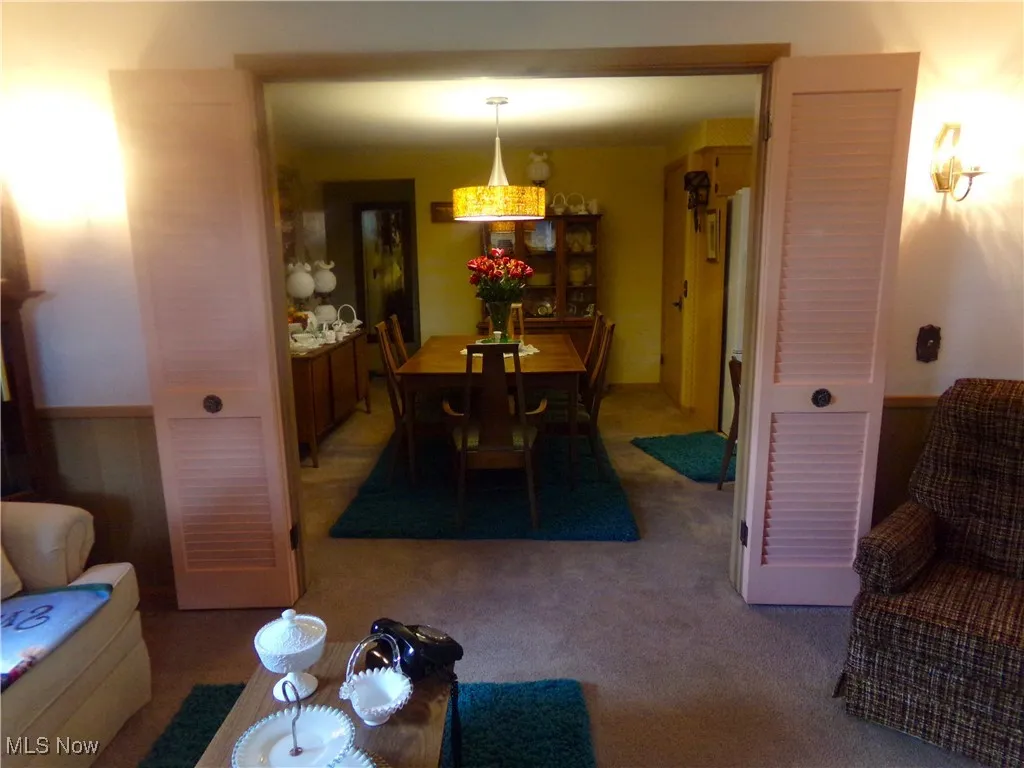 View of carpeted dining area