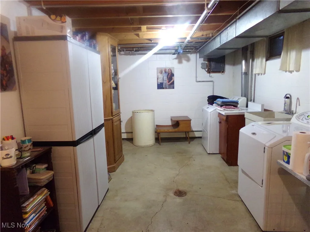 Washroom with separate washer and dryer