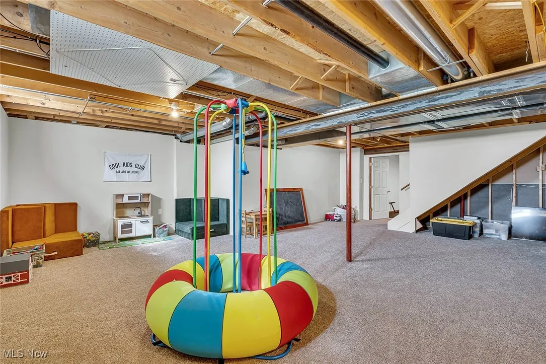 Basement with carpet