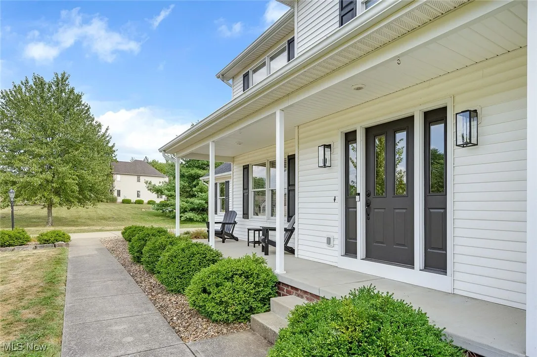 Property entrance featuring a porch