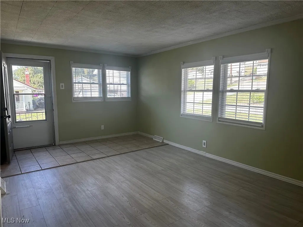 Living room with front entrance door