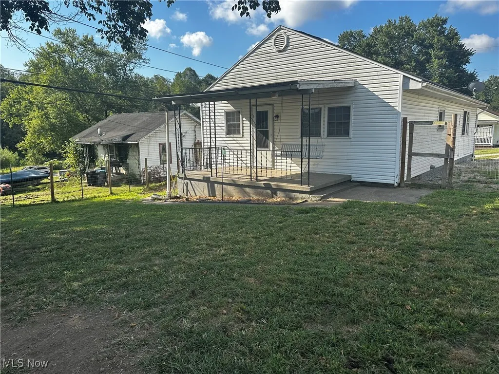 Back porch with fenced back yard