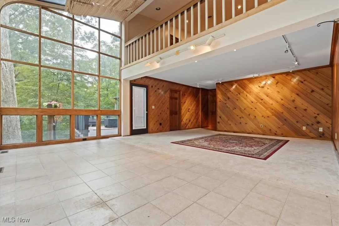 Living and Dining Room.  Atrium Open To 2nd Floor