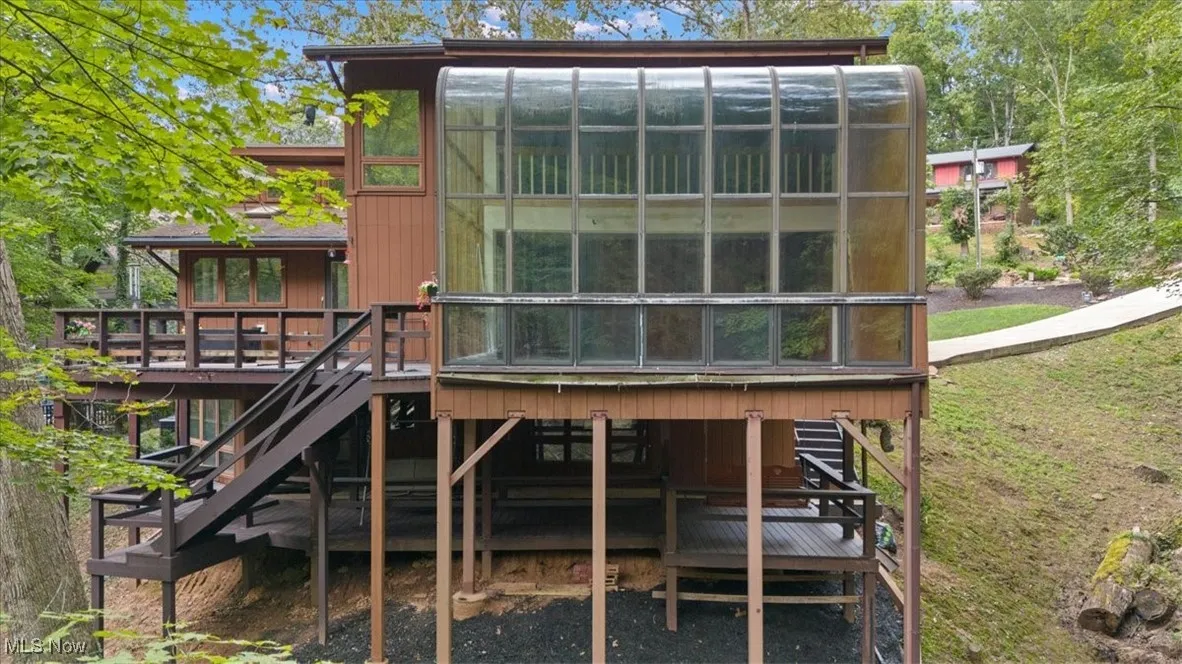 Atrium Overlooking Woods And Creek