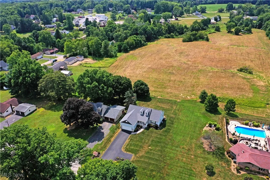 Aerial view of property's location with rural landscape