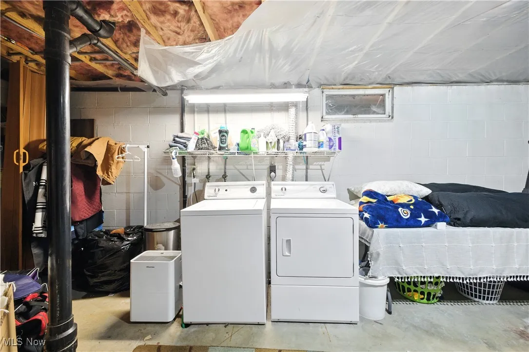 Laundry area featuring washer and clothes dryer