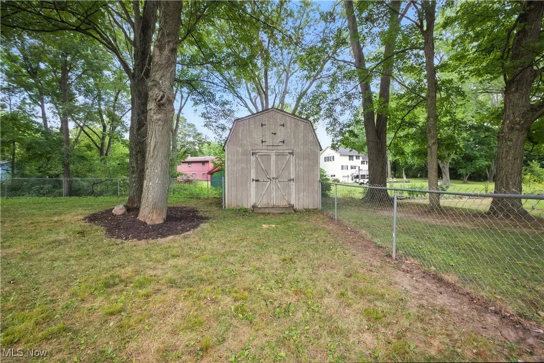 View of shed with view of scattered trees