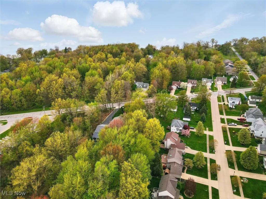 Aerial view with a residential view and a forest view