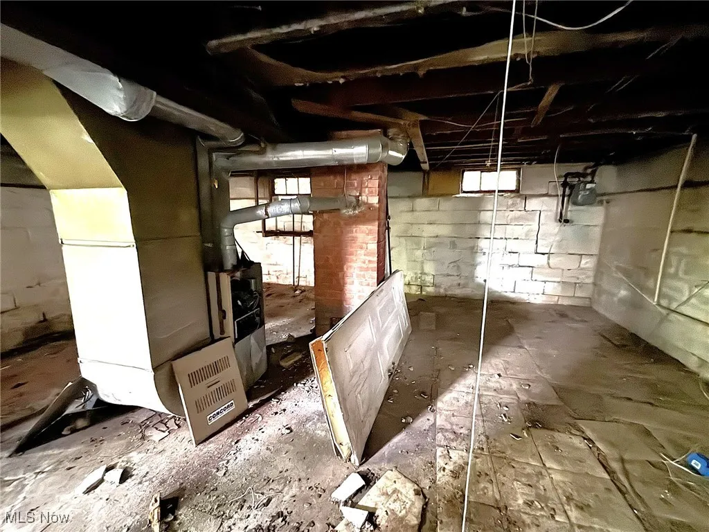 Below grade area with heating unit