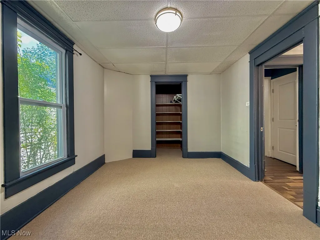 First floor bedroom view to closet