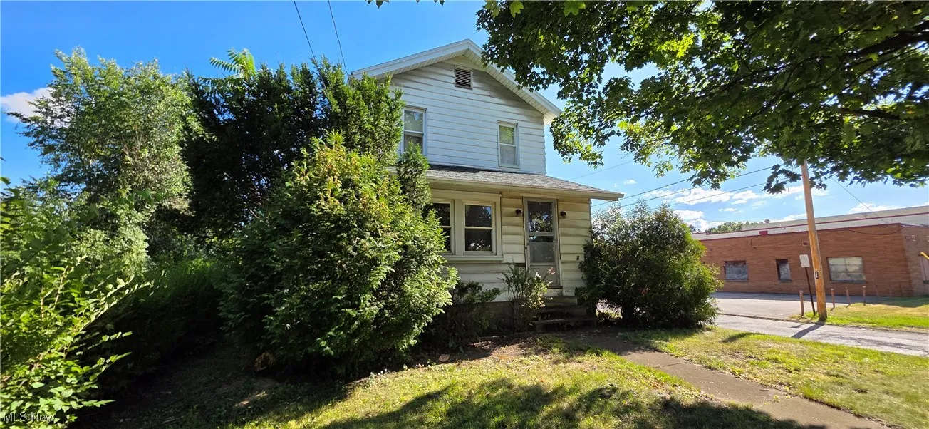 View of front facade featuring covered porch