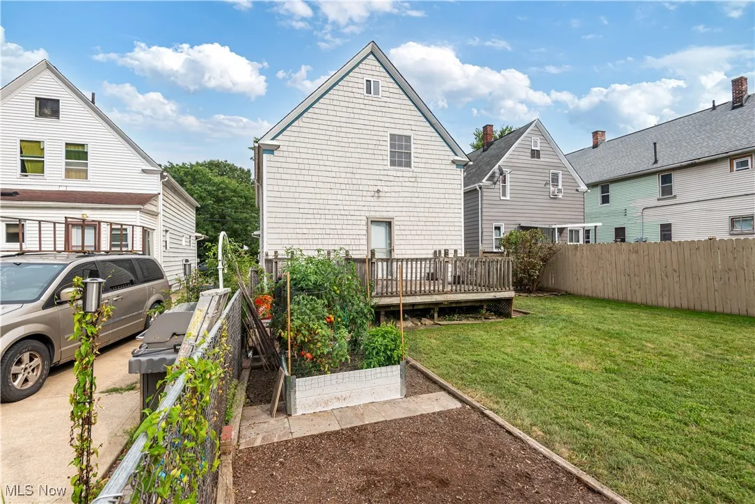 Rear view of house with a deck