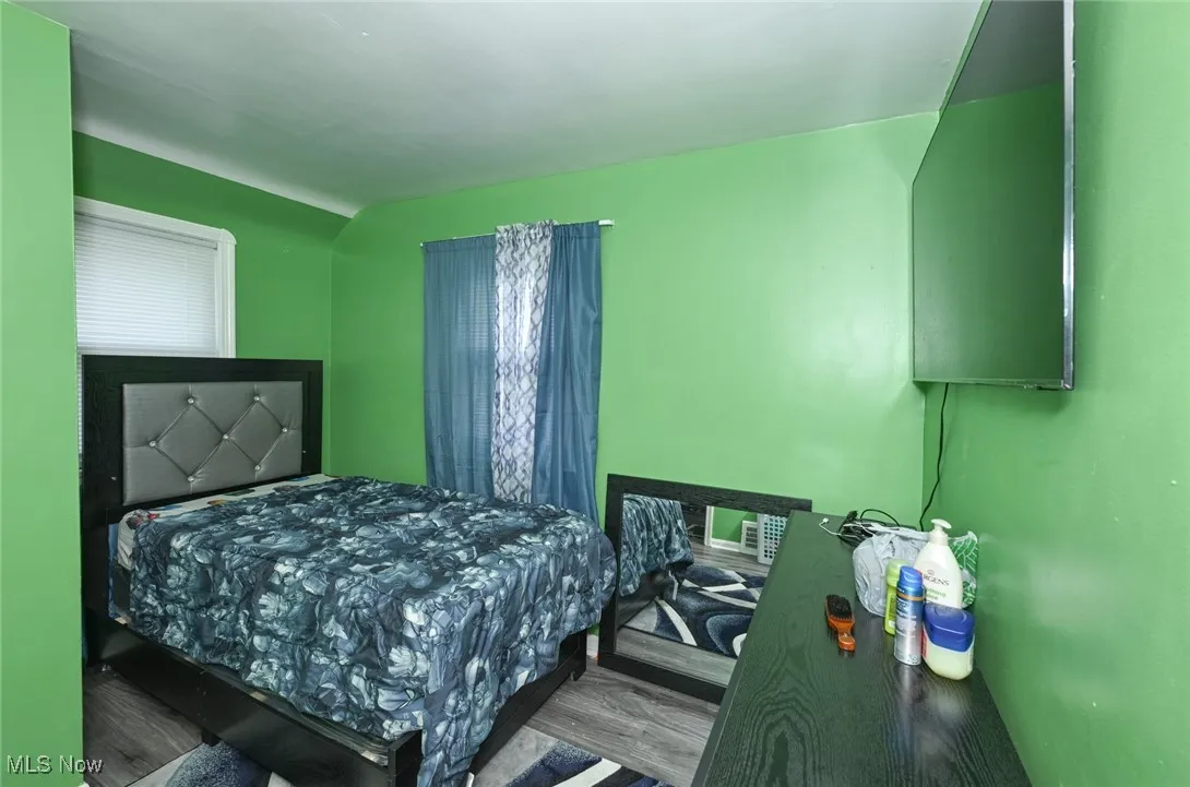 Bedroom featuring wood finished floors