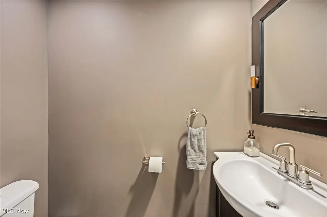 Half bath with toilet and vanity