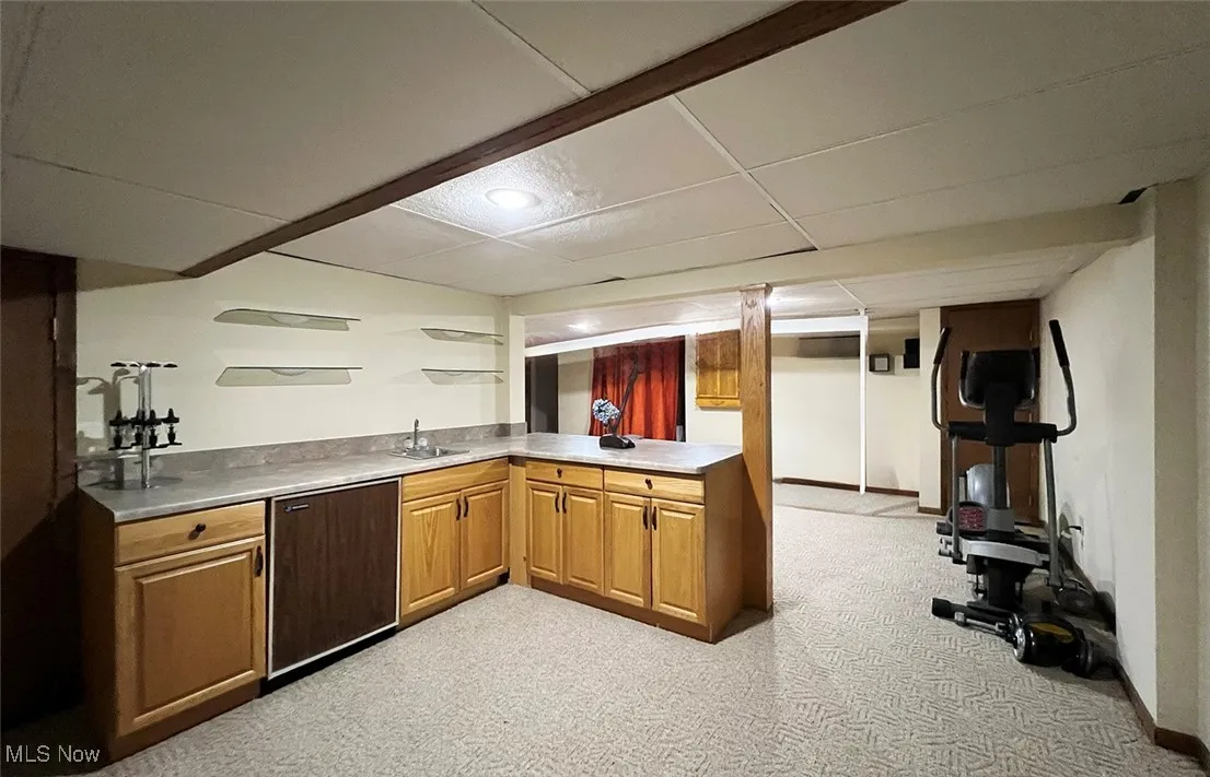 finished basement with bar and half bath