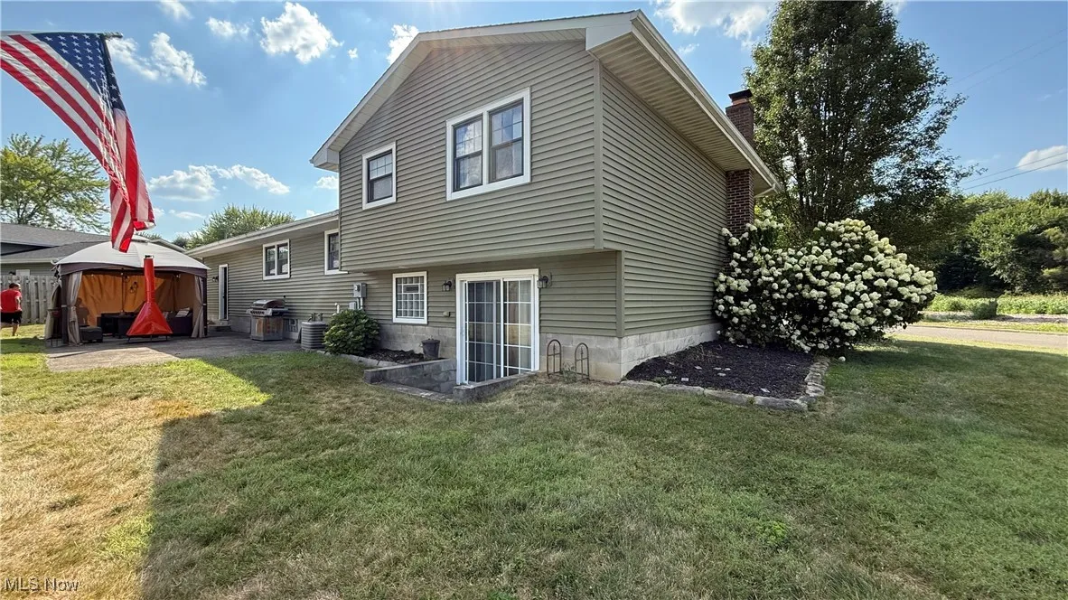 Back of property featuring a patio area