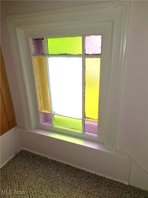 Original stain glass window on stair landing