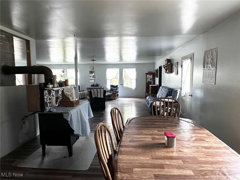 Dining area with wood finished floors