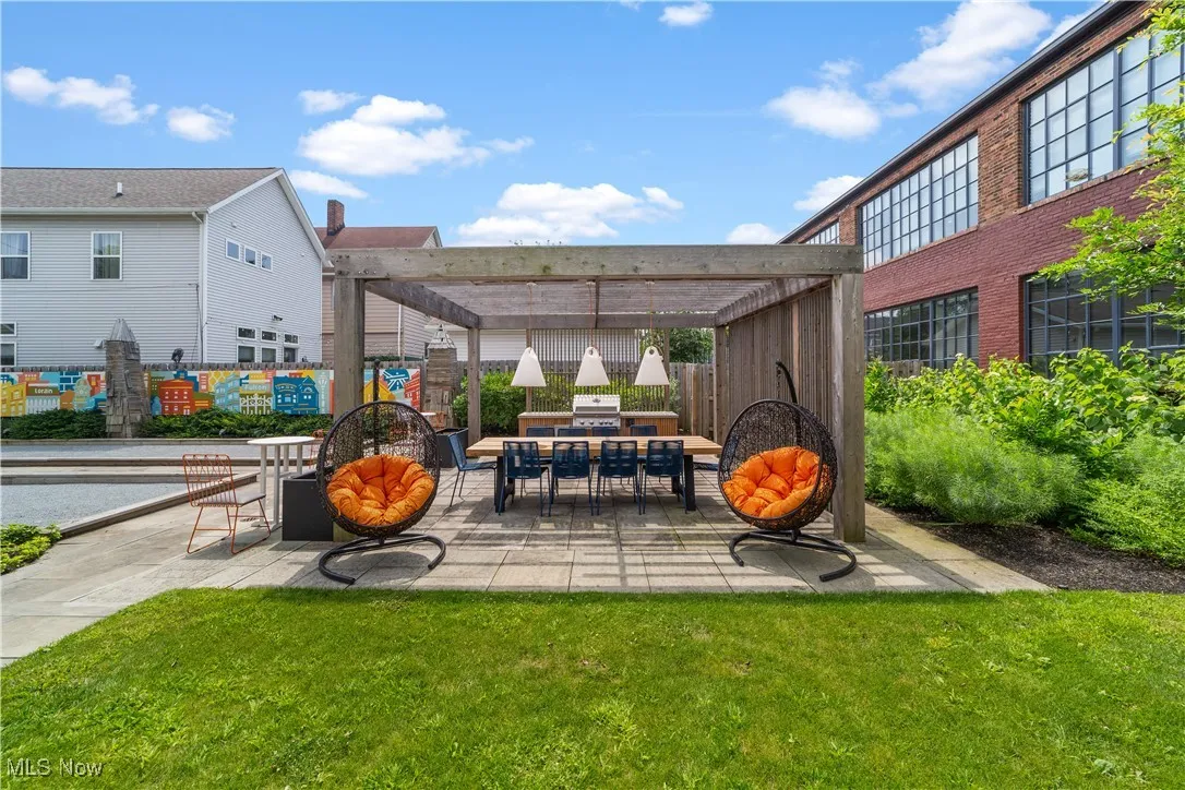 Internal courtyard with dining space and comfortable seating
