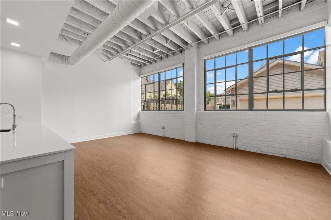 View of living room with ten foot windows
