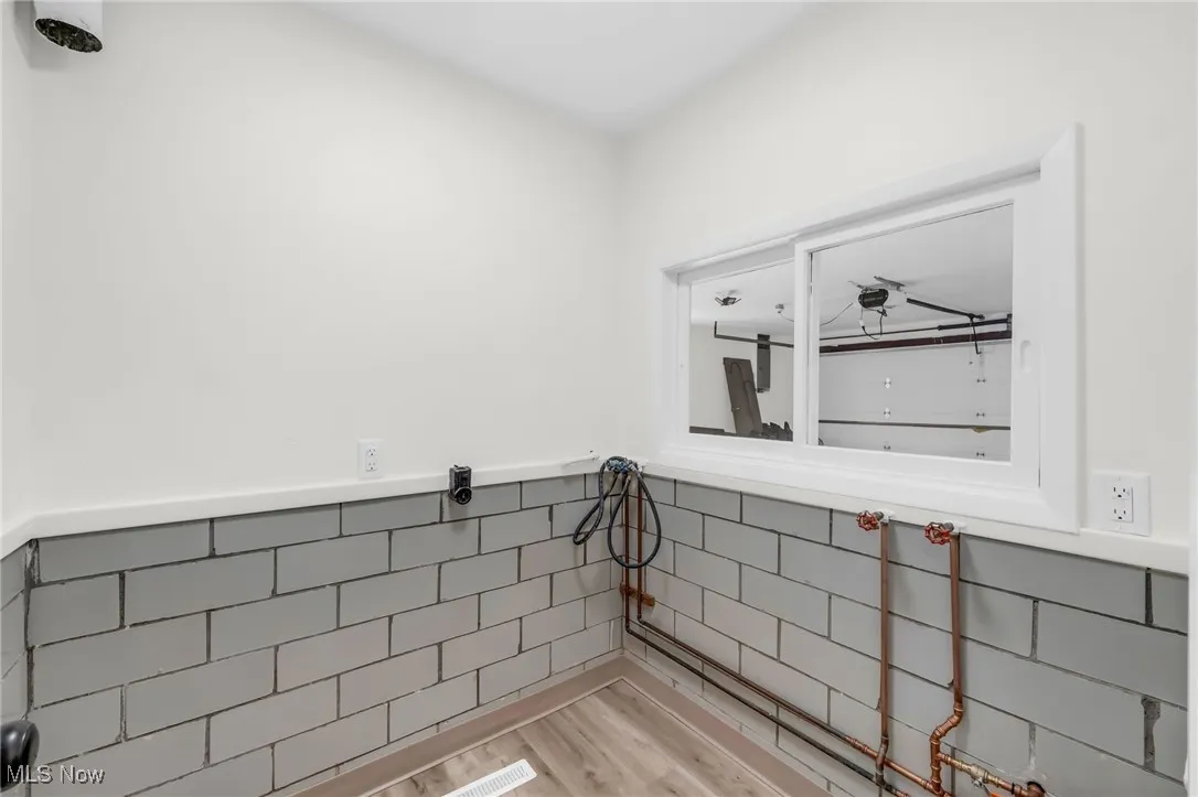 Bathroom featuring light wood-type flooring