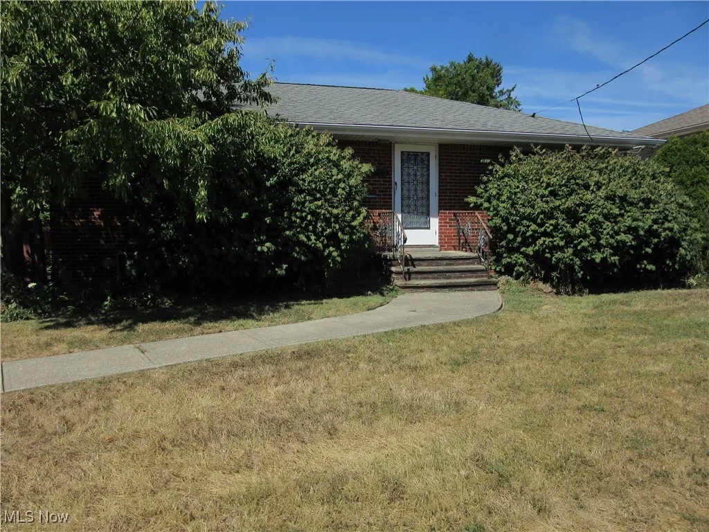 Front of all brick ranch
