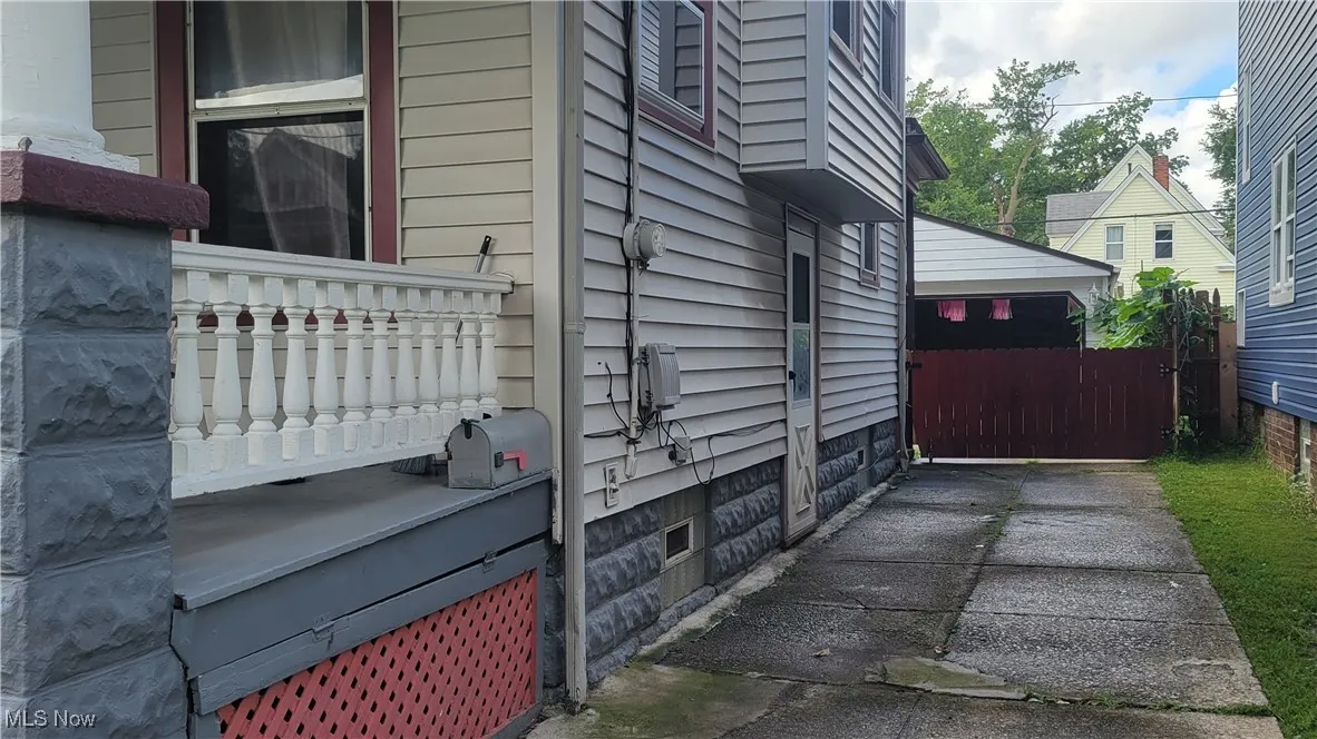 View of side of home featuring a garage