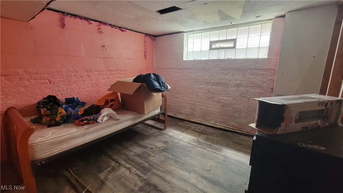 Bedroom with wood finished​​‌​​​​‌​​‌‌​‌‌​​​‌‌​‌​‌​‌​​​‌​​ floors