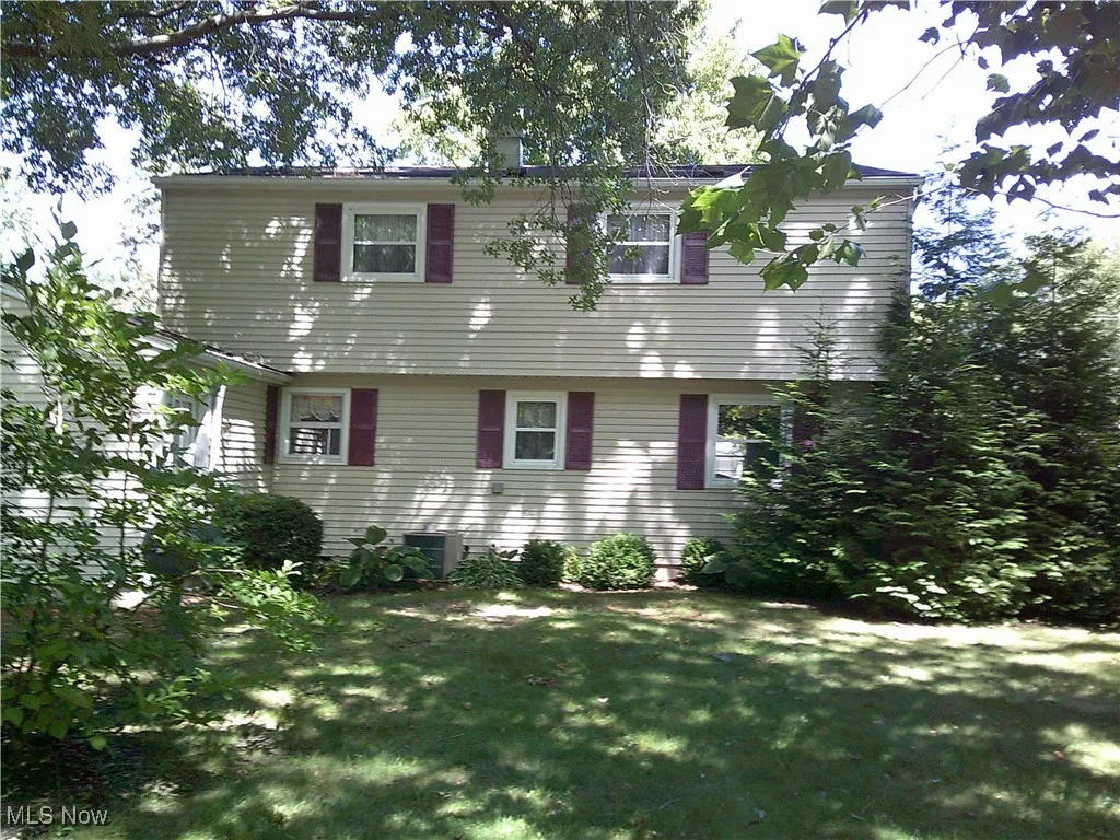 Colonial house with a front yard