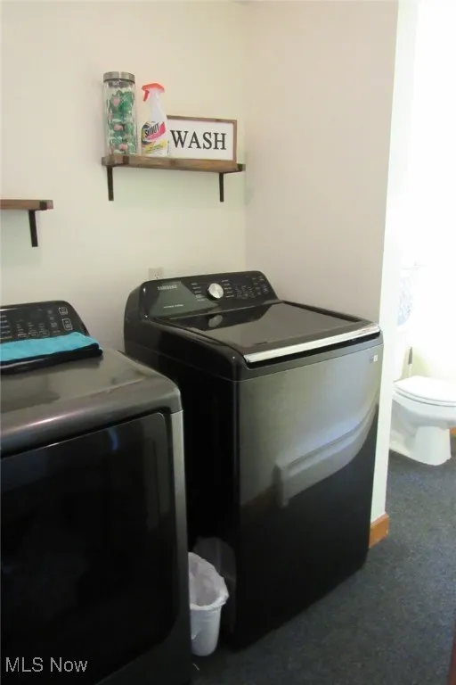 Laundry room and half bath on ground level.