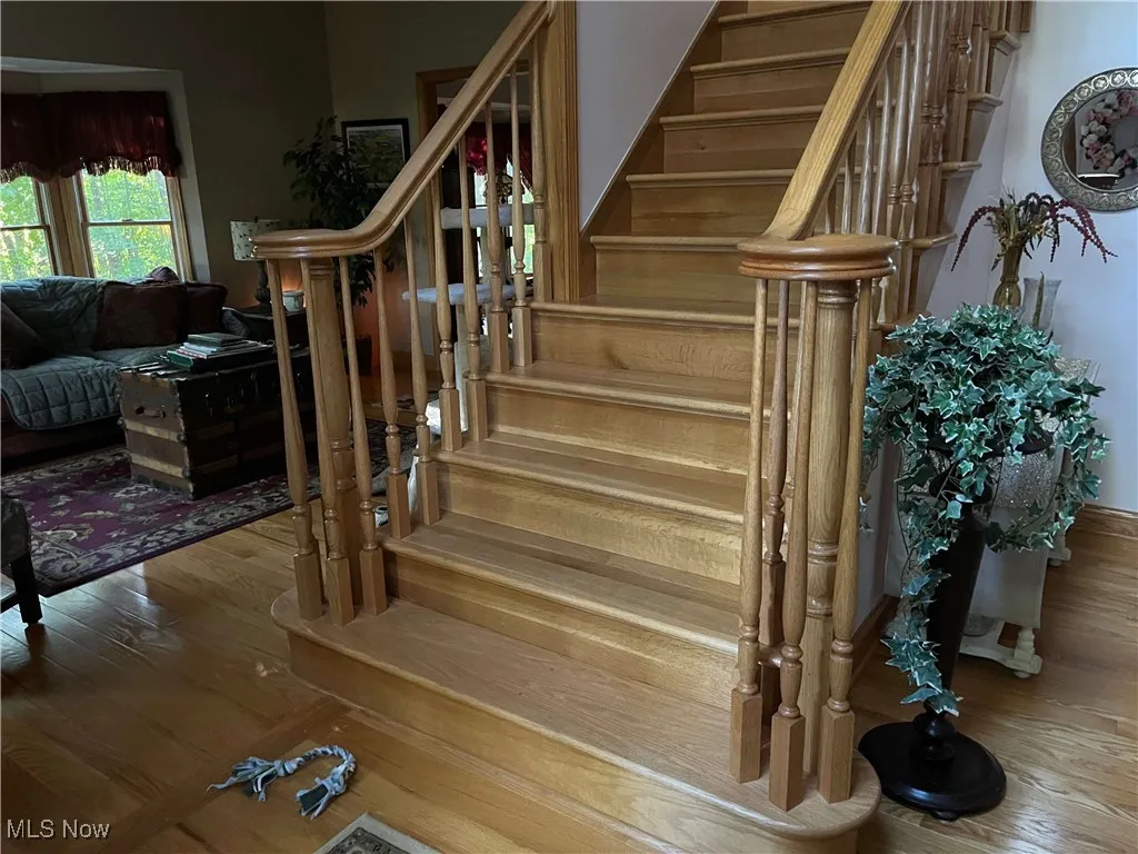 Stairway with wood finished floors