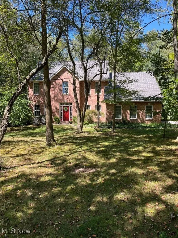 View of front of house with a front lawn