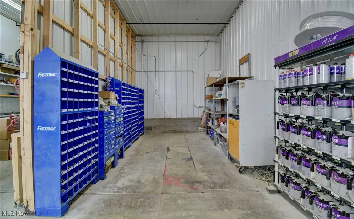 Garage featuring metal wall