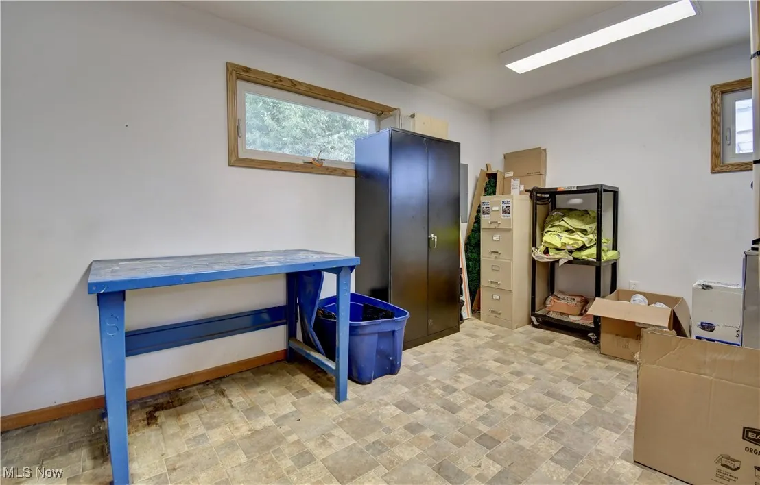 Home office featuring baseboards