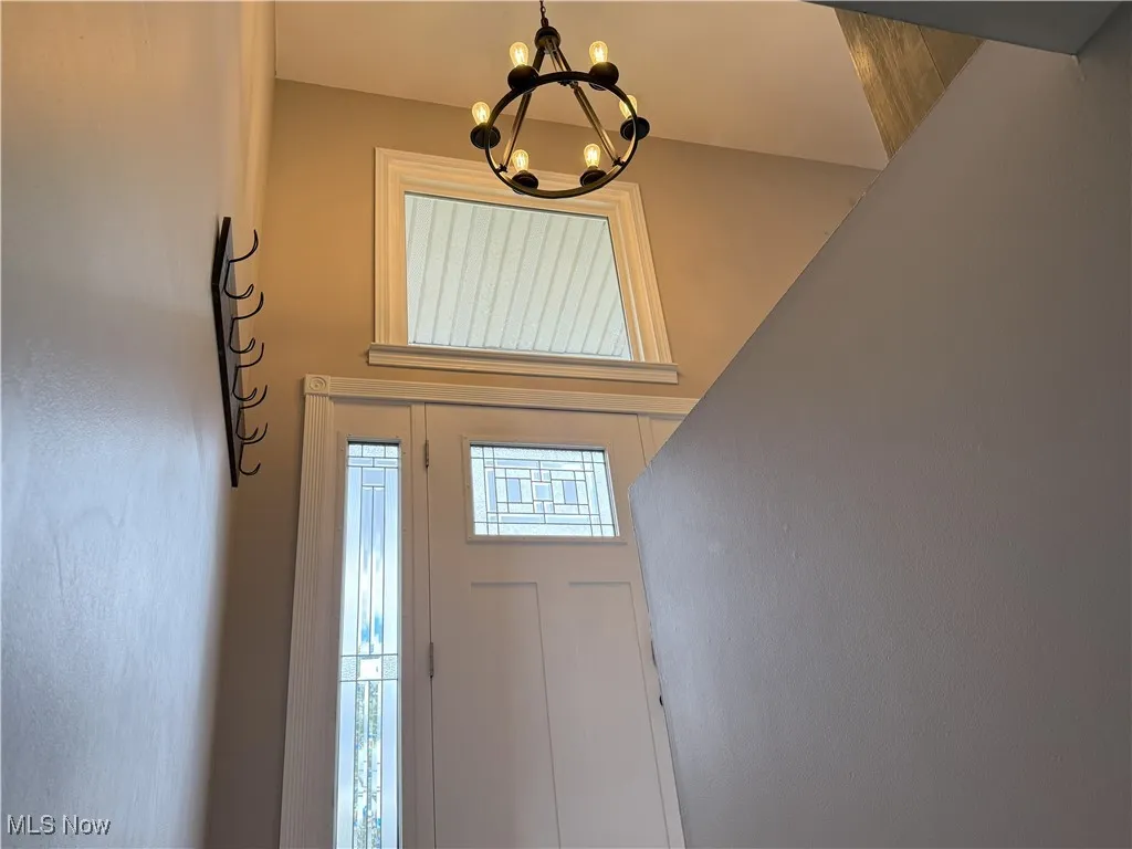 Entryway with a chandelier