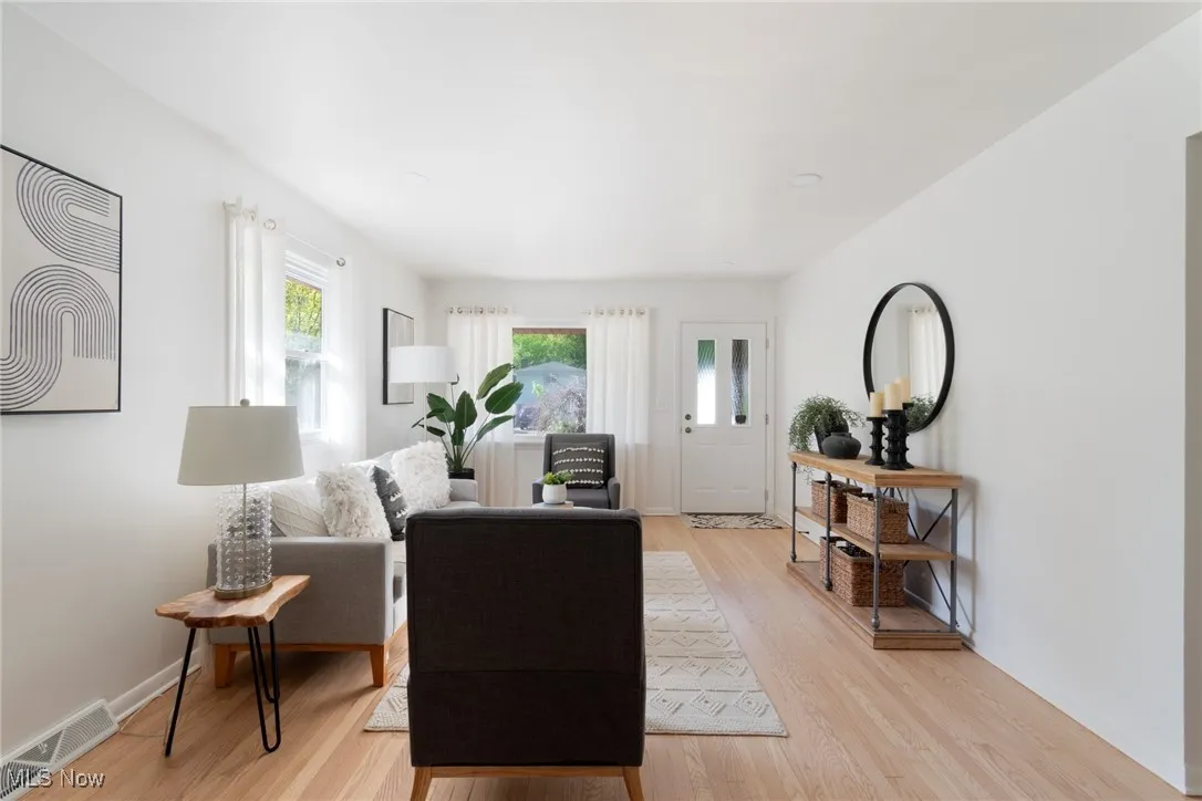 Living room with light wood finished floors