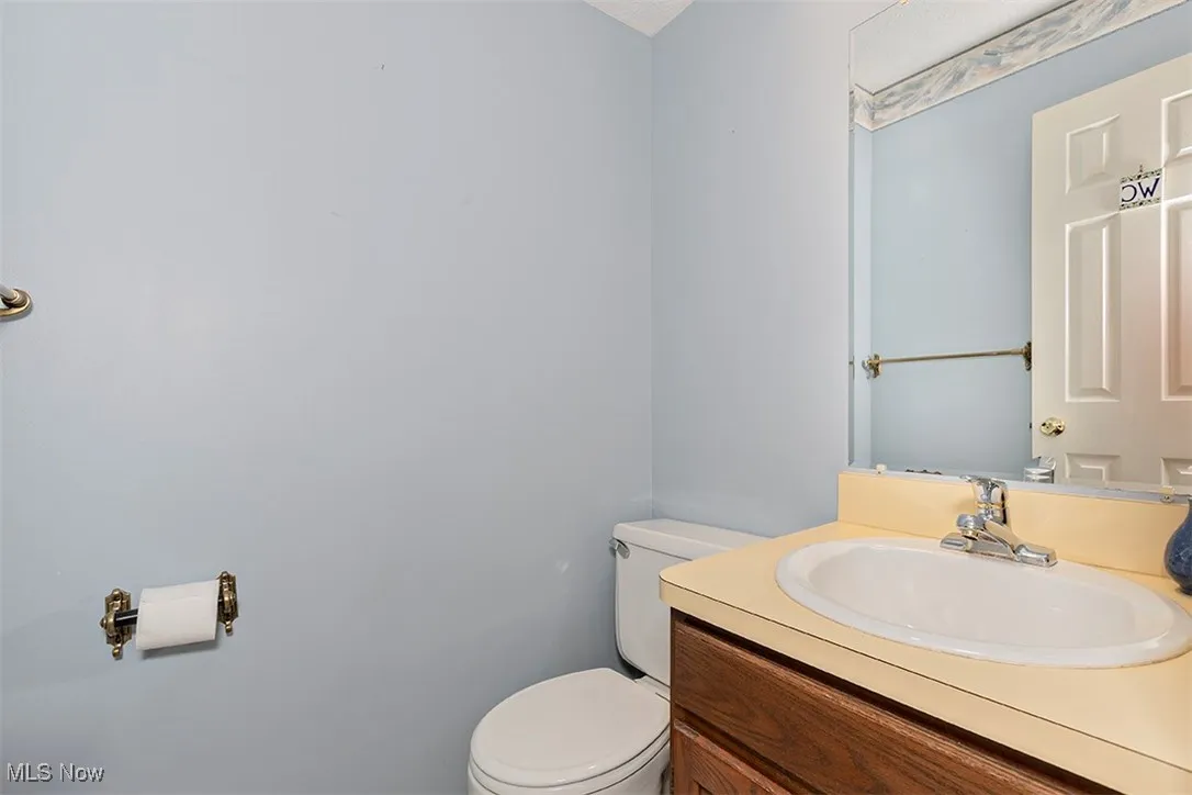 Bathroom with vanity and toilet