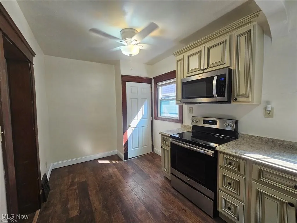 eat in kitchen nook and door to basement and side door