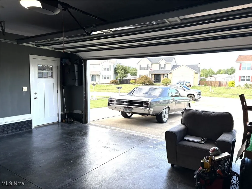 Garage featuring a residential view