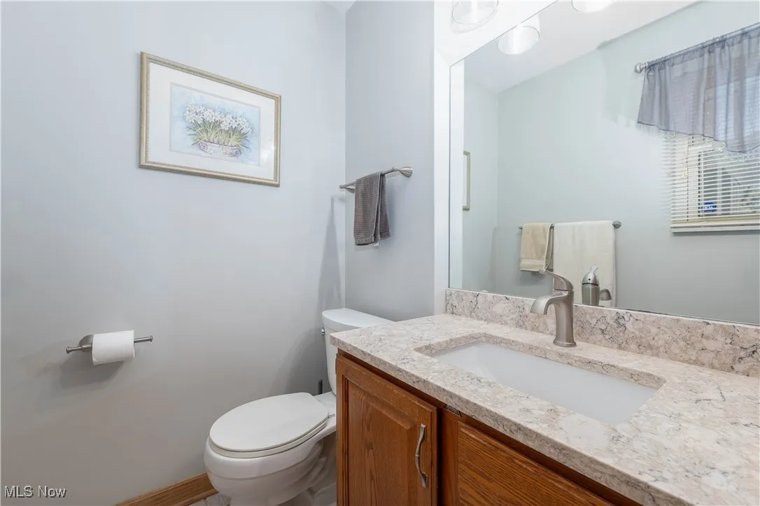 Bathroom featuring toilet and vanity