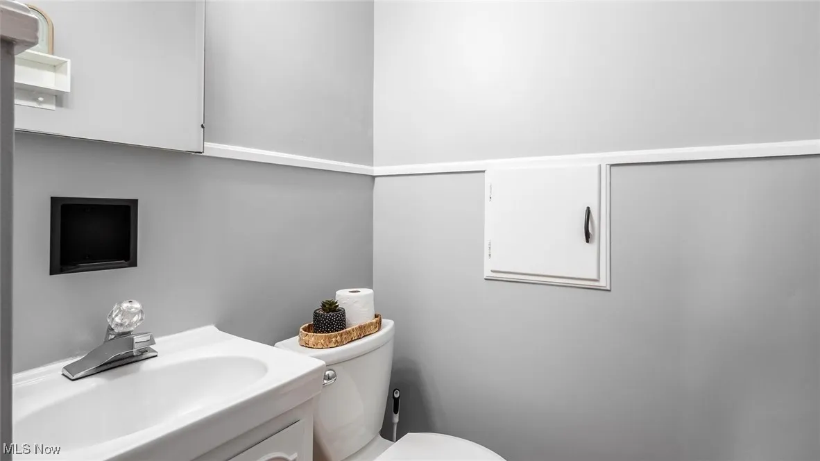 Bathroom featuring toilet and vanity