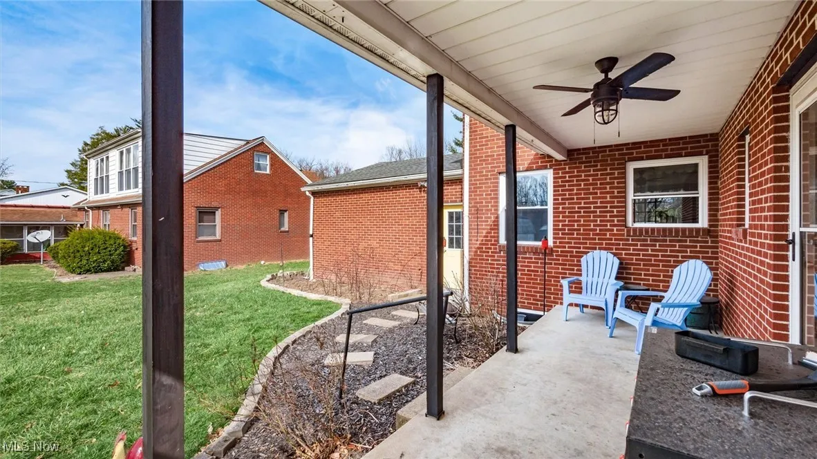 View of patio featuring a ceiling fan
