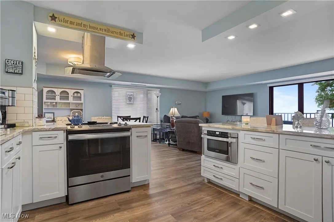 updated Kitchen with island exhaust hood