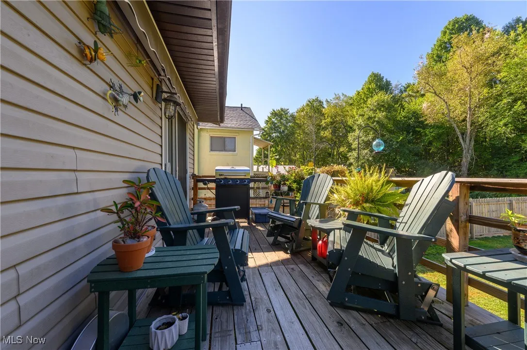 Wooden terrace with area for grilling