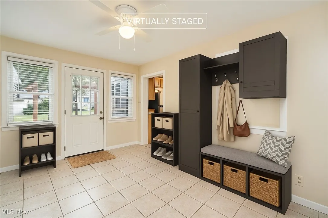 virtually staged breezeway to show potential to use as a mud room or for extra storage