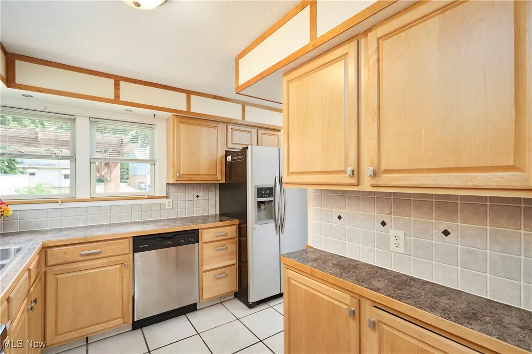 lots of windows in the kitchen provide natural light