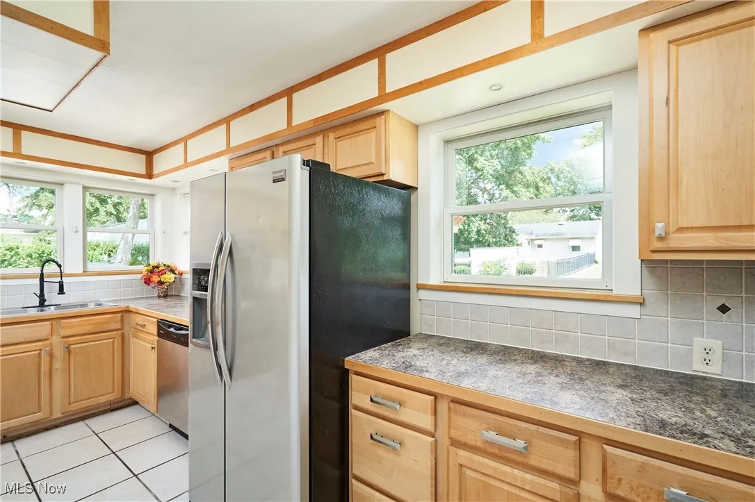 Kitchen has lots of cabinets and counter space