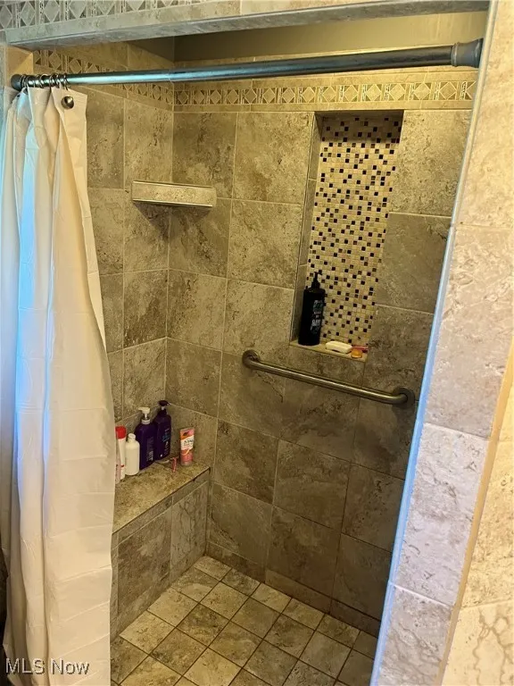 Bathroom with a shower stall